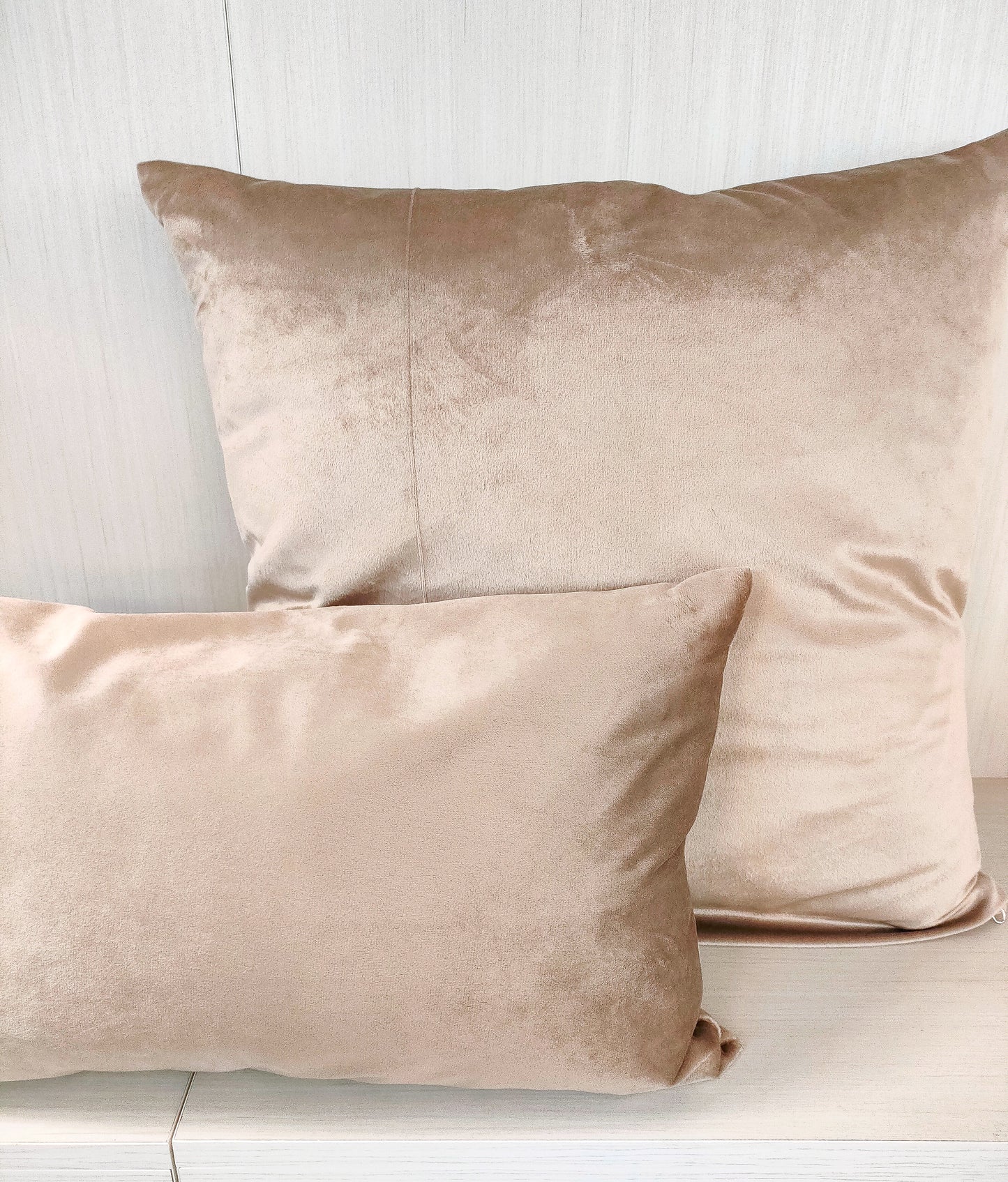 Beige velvet cushions