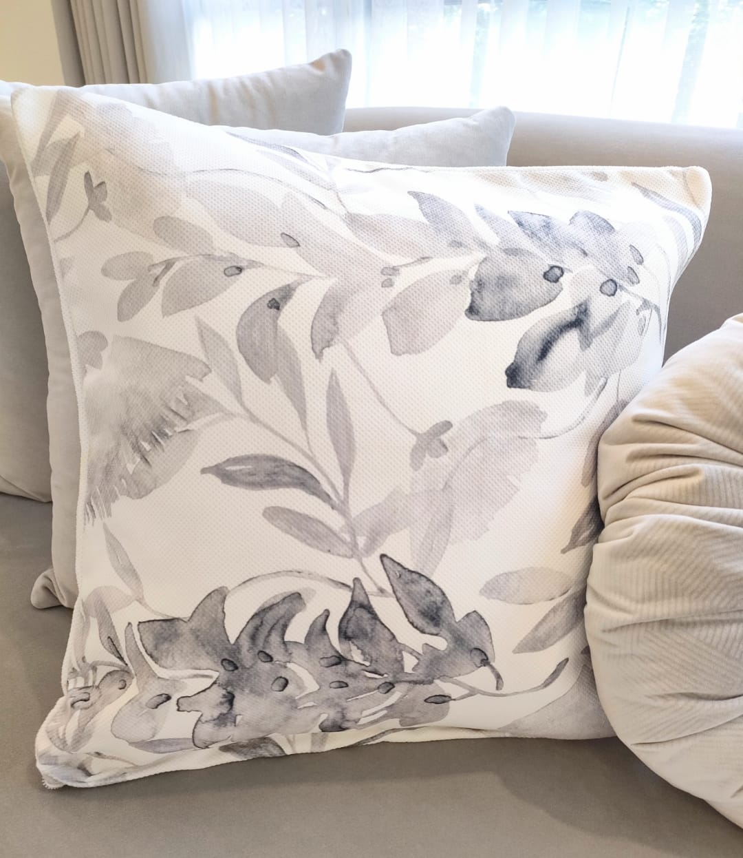 Gray leaves cushion